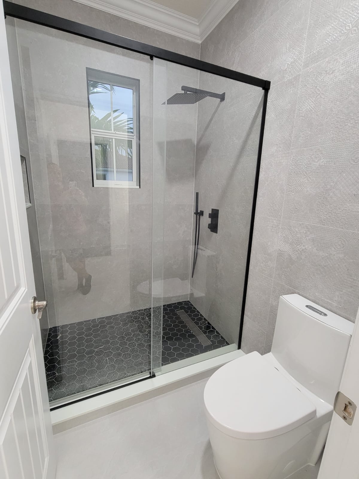 Walk-in glass shower remodel