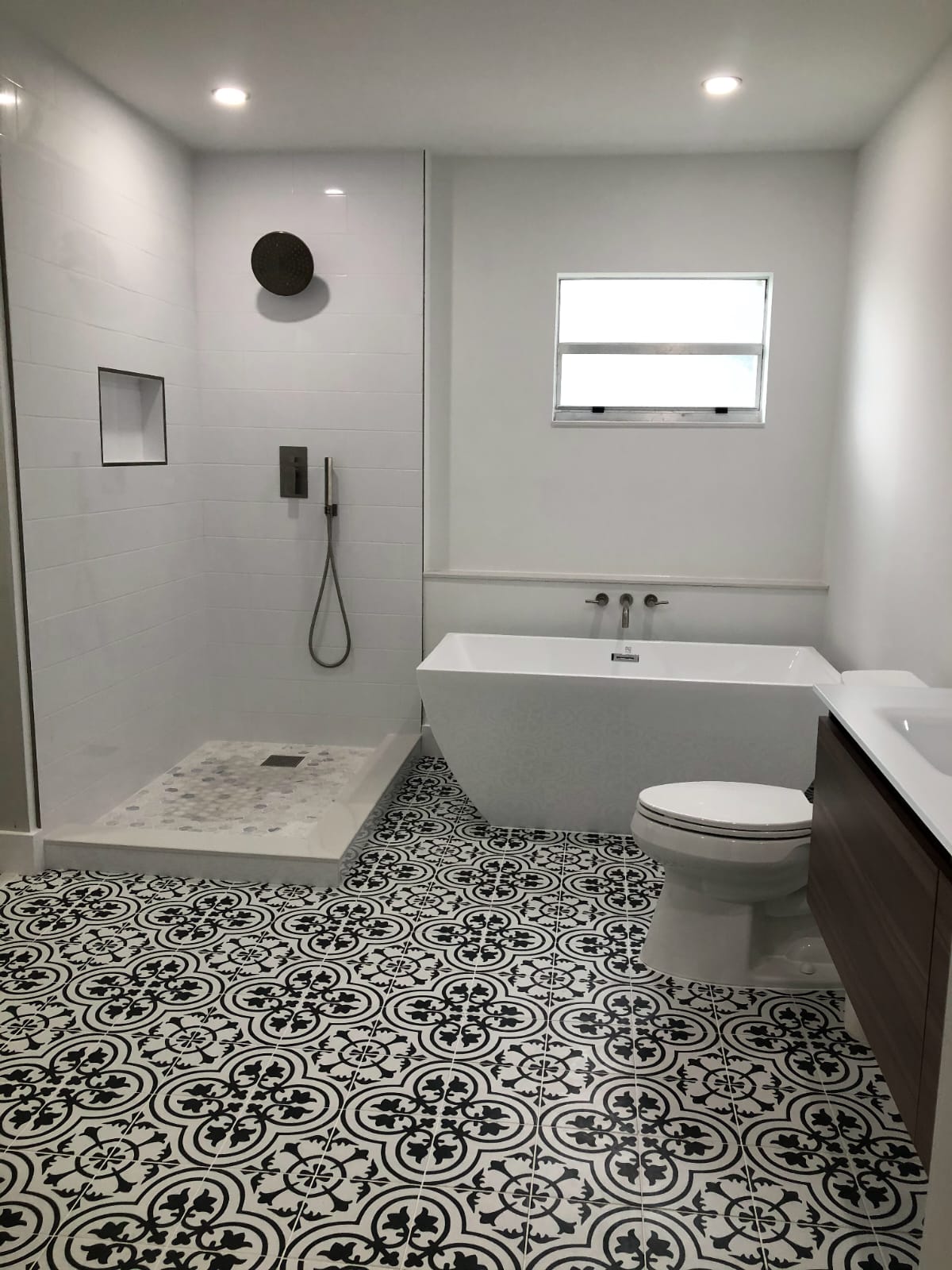 Patterned tile bathroom floor