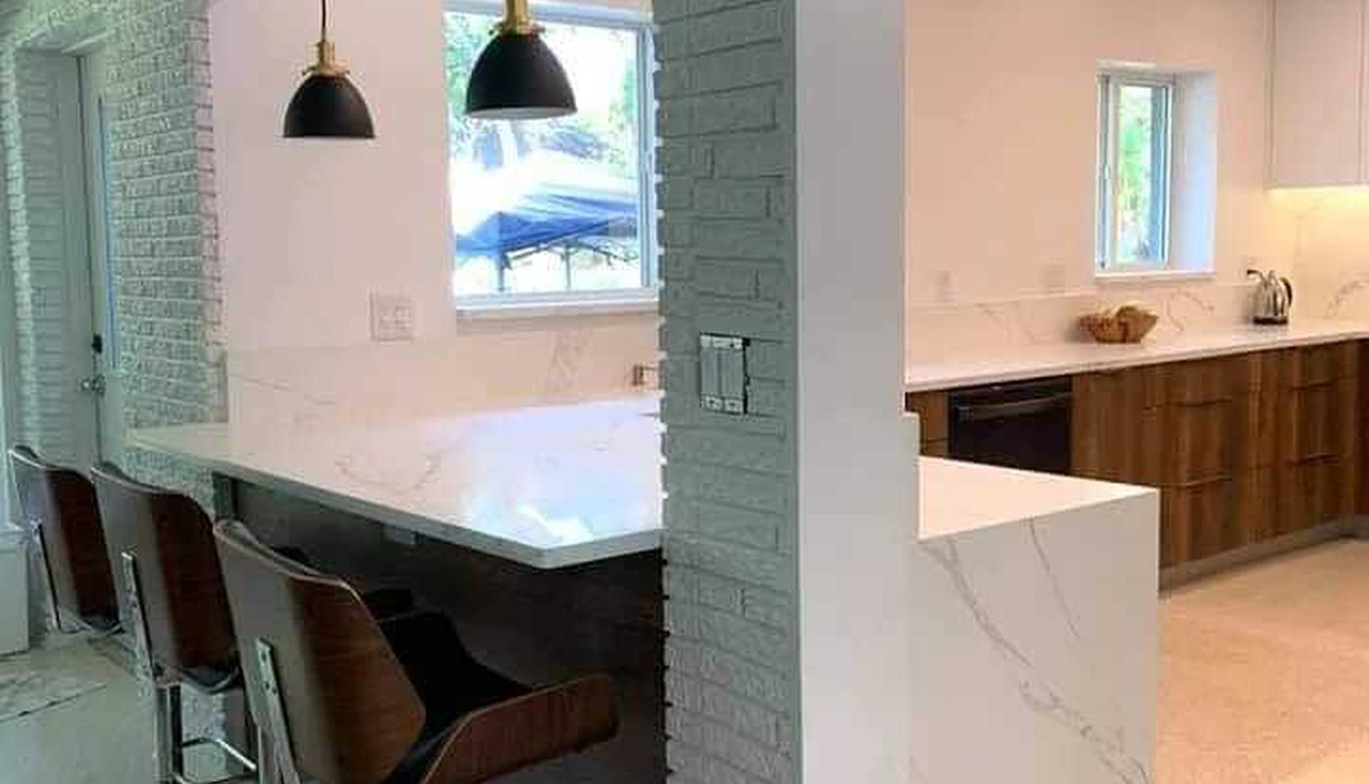 Modern white kitchen remodel by AP Interior Solutions