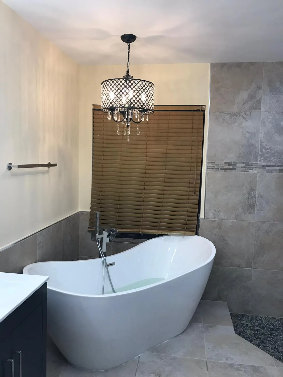 Spa-style bathroom remodel with freestanding soaking tub